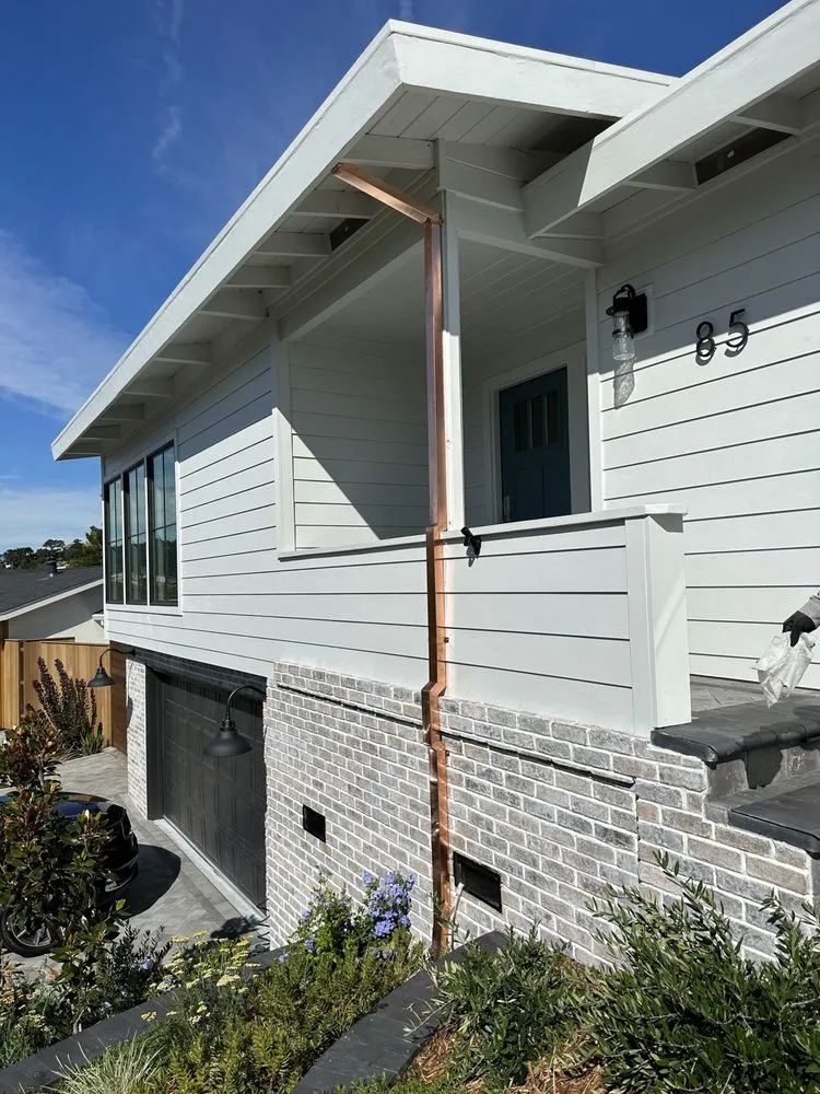 Slide of Mistah Seamless Gutters