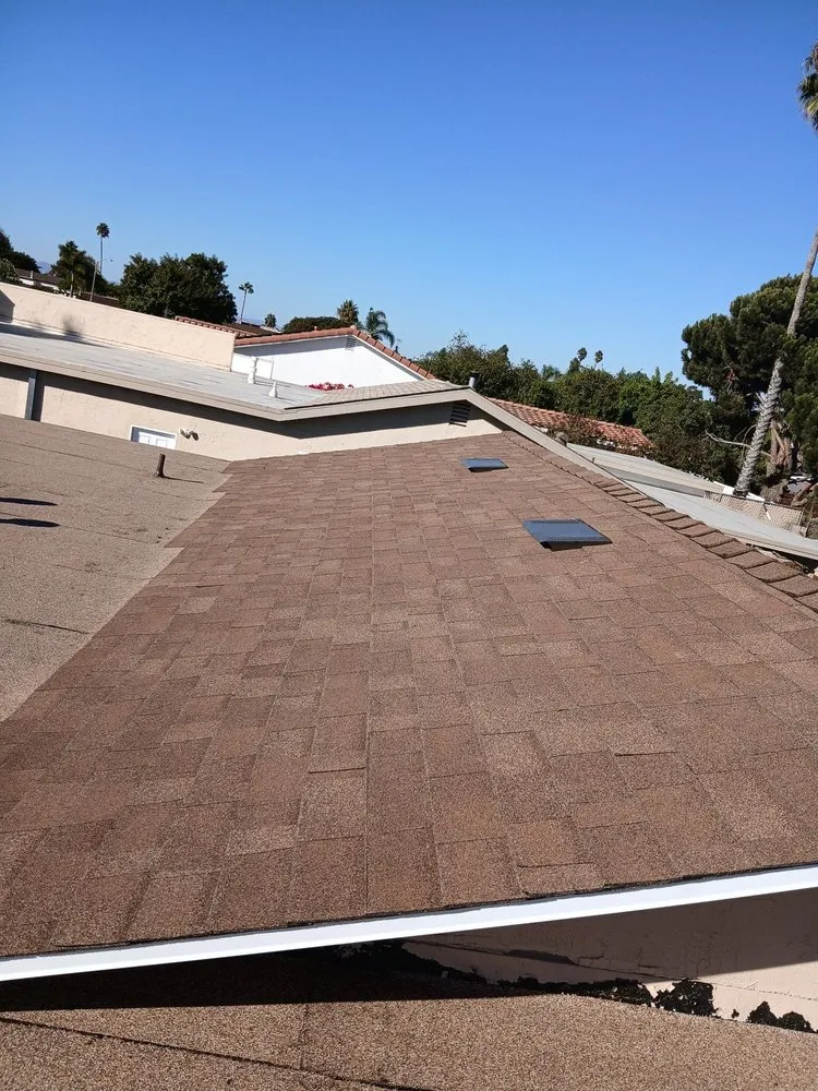 Slide of Mister Roofing