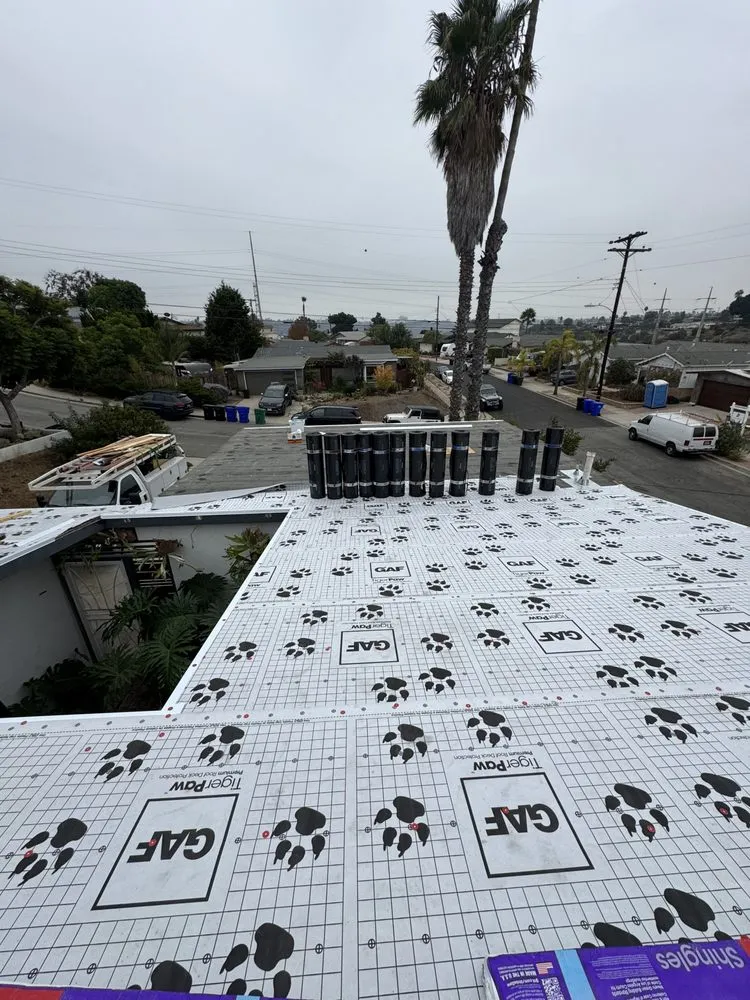 Slide of Mister Roofing