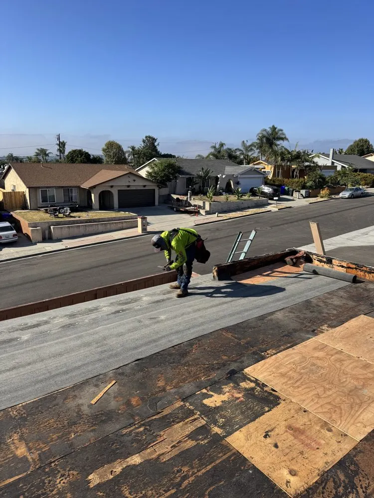 Slide of Mister Roofing