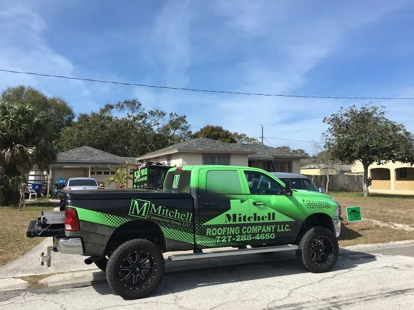 Slide of Mitchell Roofing Company