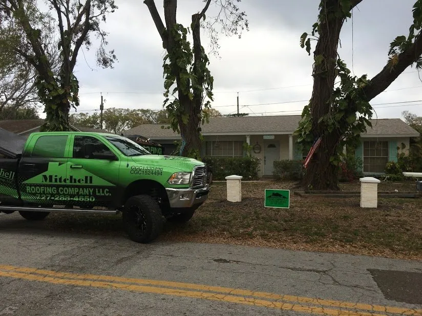Slide of Mitchell Roofing Company