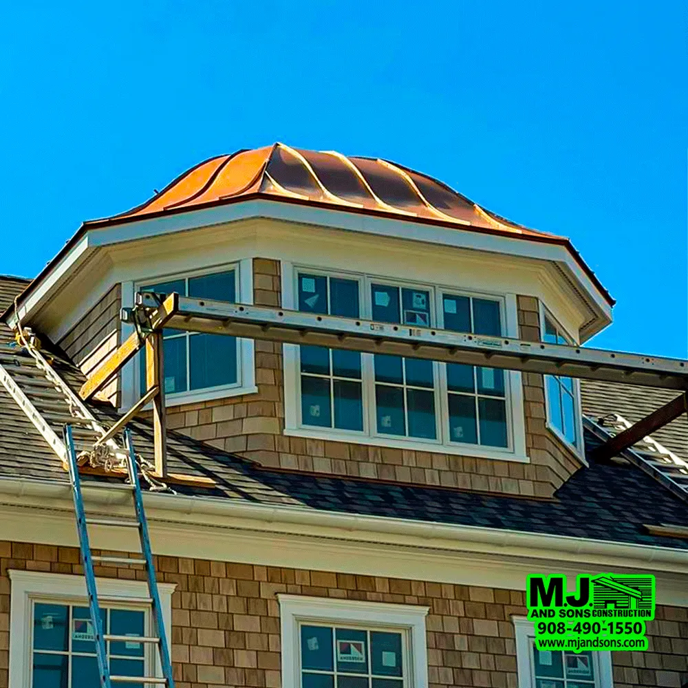 Slide of MJ and Sons Construction