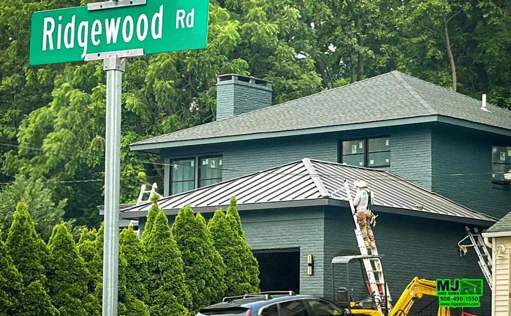 Slide of MJ and Sons Construction