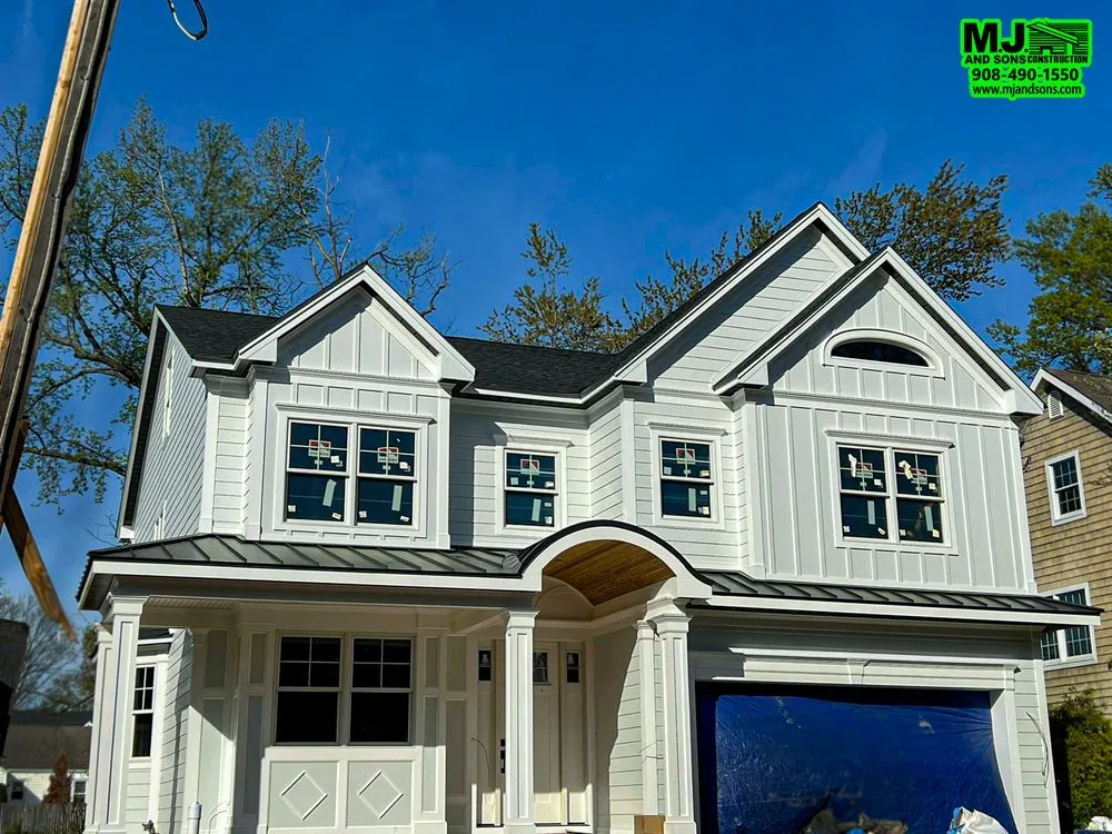 Slide of MJ and Sons Construction