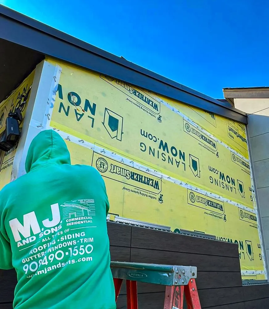 Slide of MJ and Sons Construction