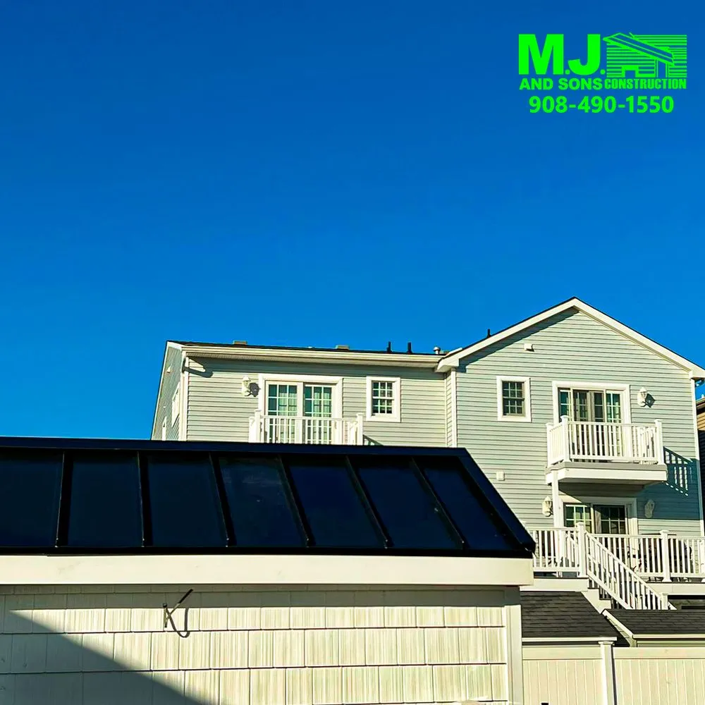 Slide of MJ and Sons Construction