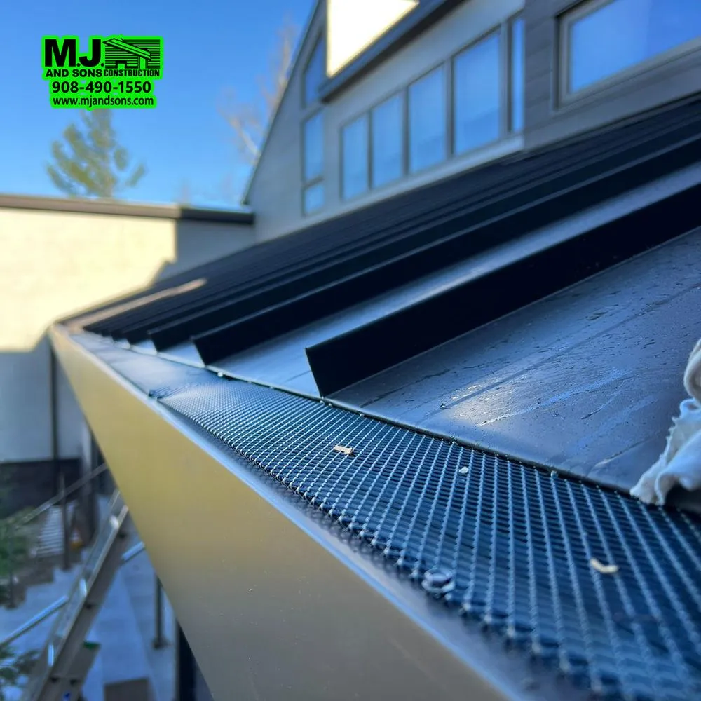 Slide of MJ and Sons Construction