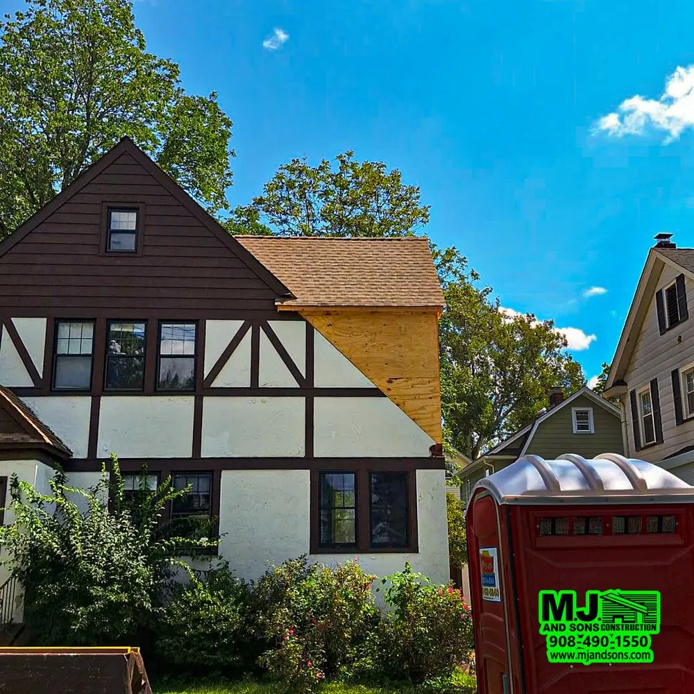 Slide of MJ and Sons Construction