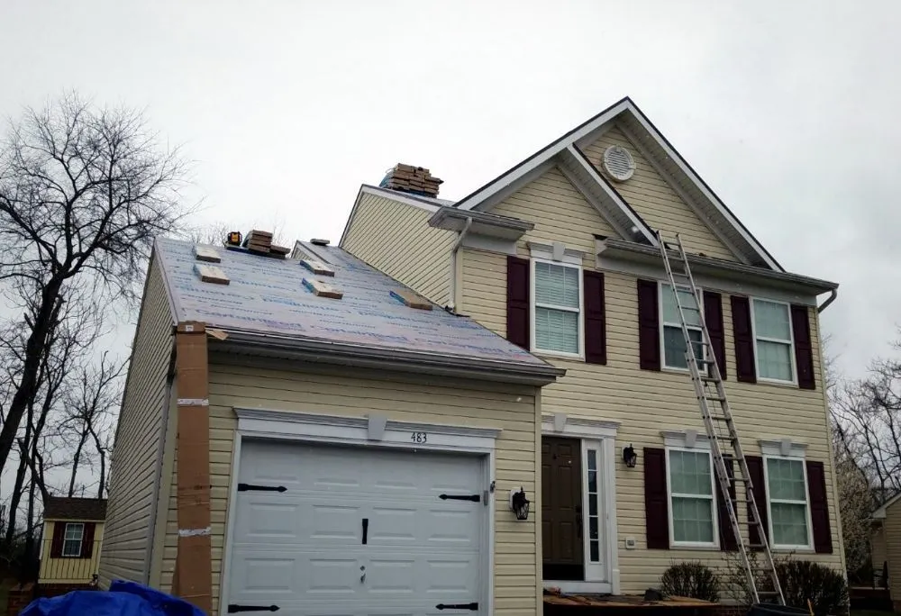 Slide of M&J Exteriors