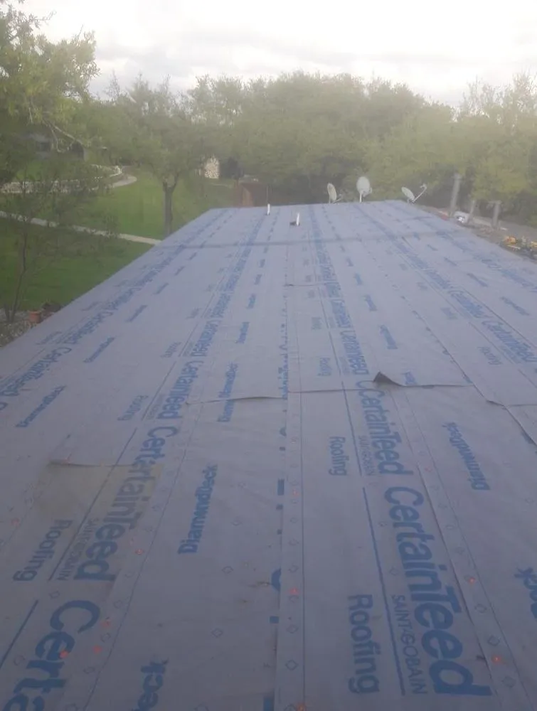 Slide of MJ Roofing & Remodeling