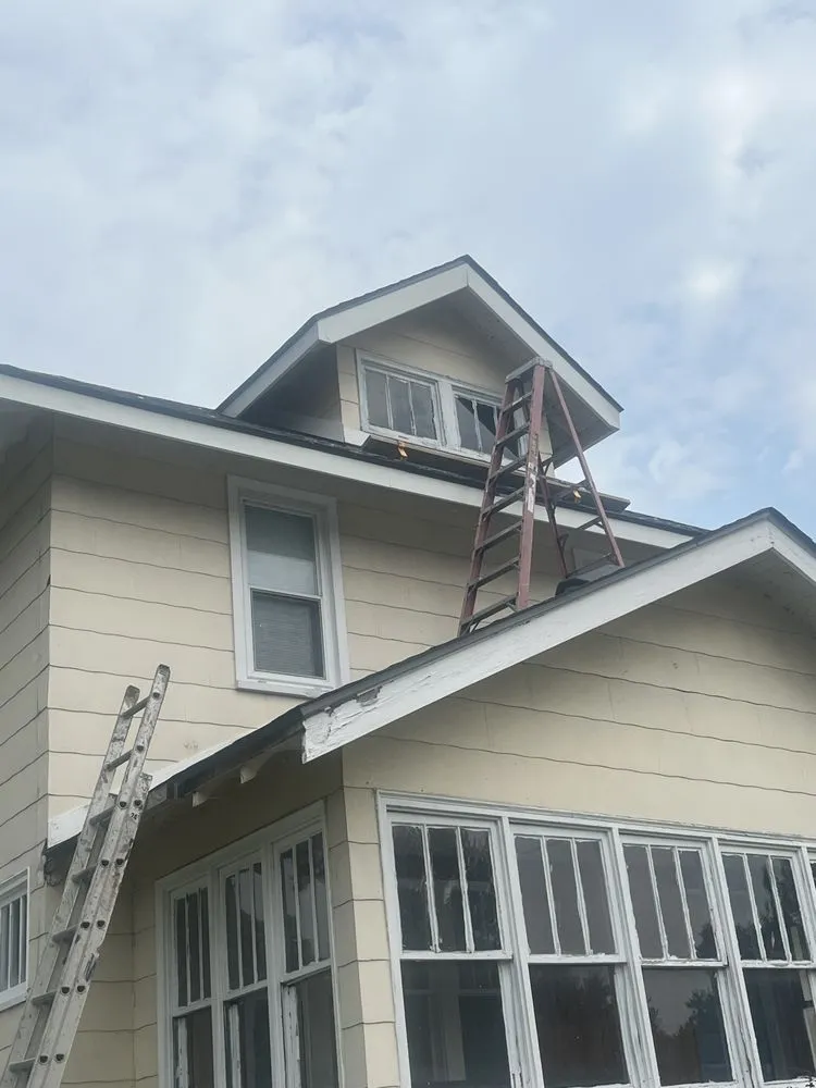 Slide of MJ Roofing and Construction