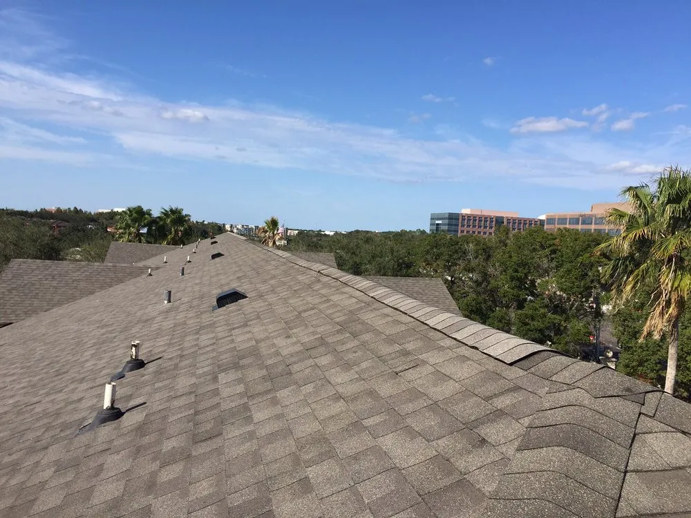 Slide of MJ Roofing and Construction