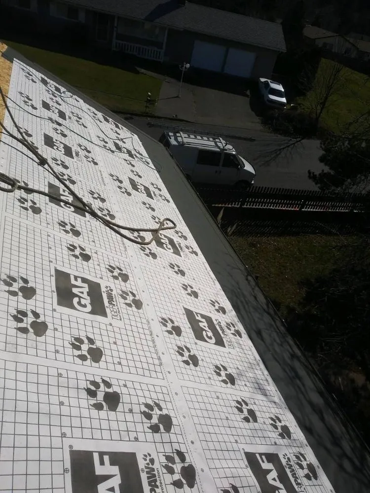 Slide of MJC Roofing