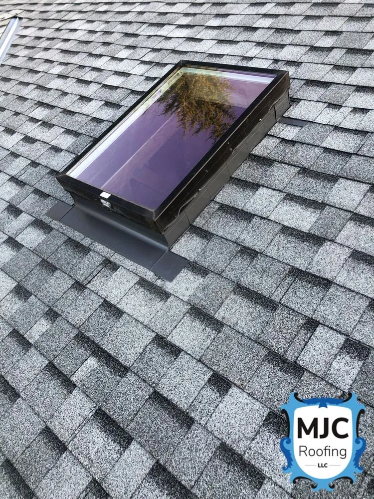 Slide of MJC Roofing
