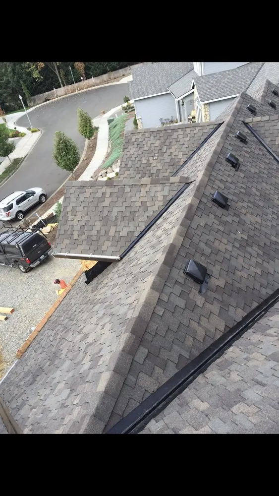 Slide of MJC Roofing