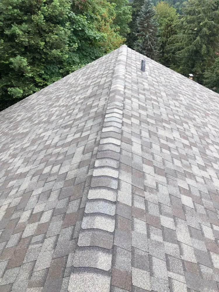 Slide of MJC Roofing