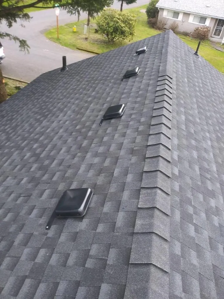 Slide of MJC Roofing