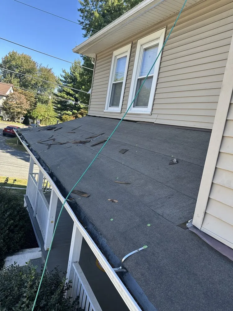 Slide of MJL Roofing