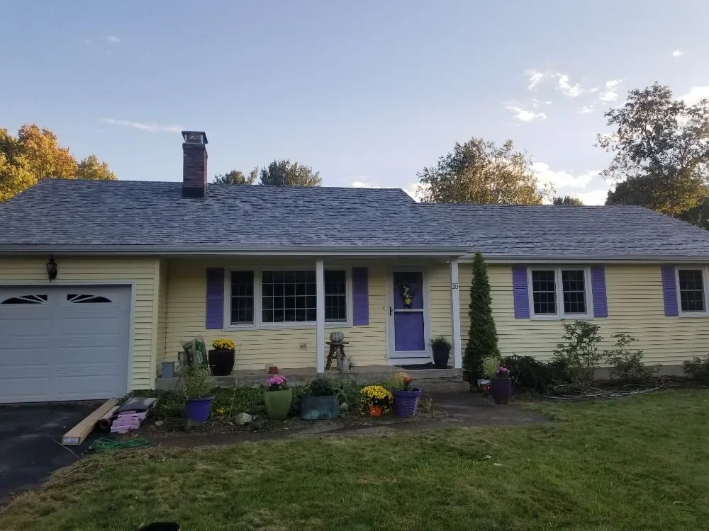 Slide of MJT Roofing