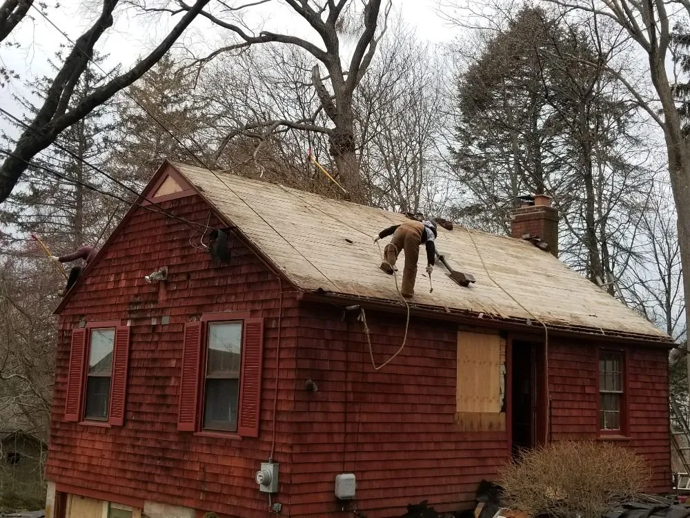 Slide of MJT Roofing