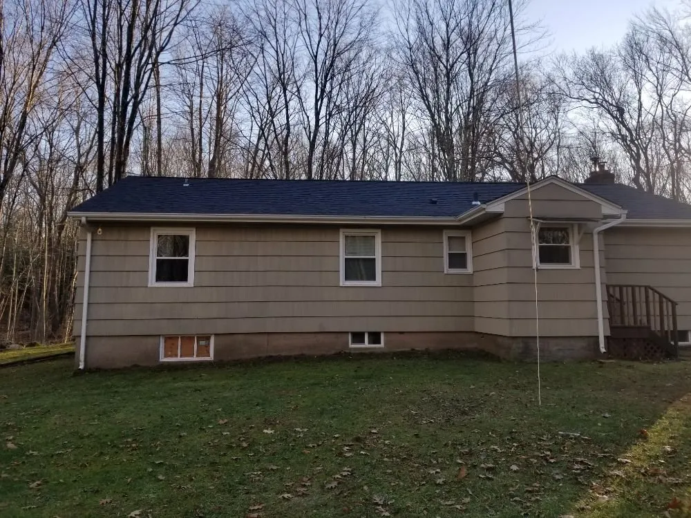 Slide of MJT Roofing