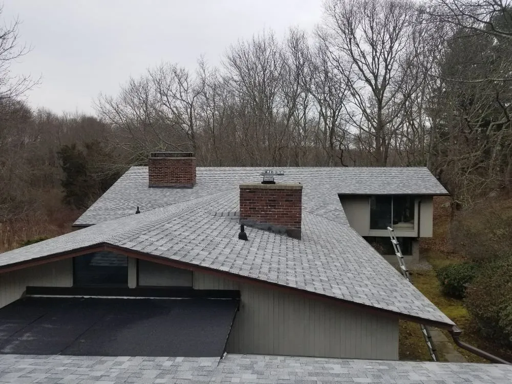 Slide of MJT Roofing