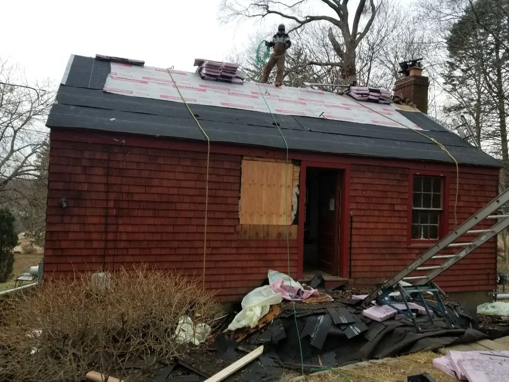 Slide of MJT Roofing