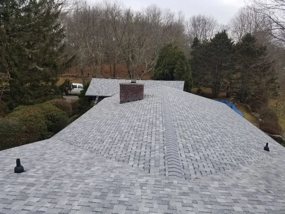 Slide of MJT Roofing