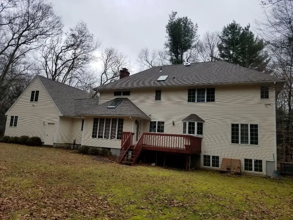 Slide of MJT Roofing