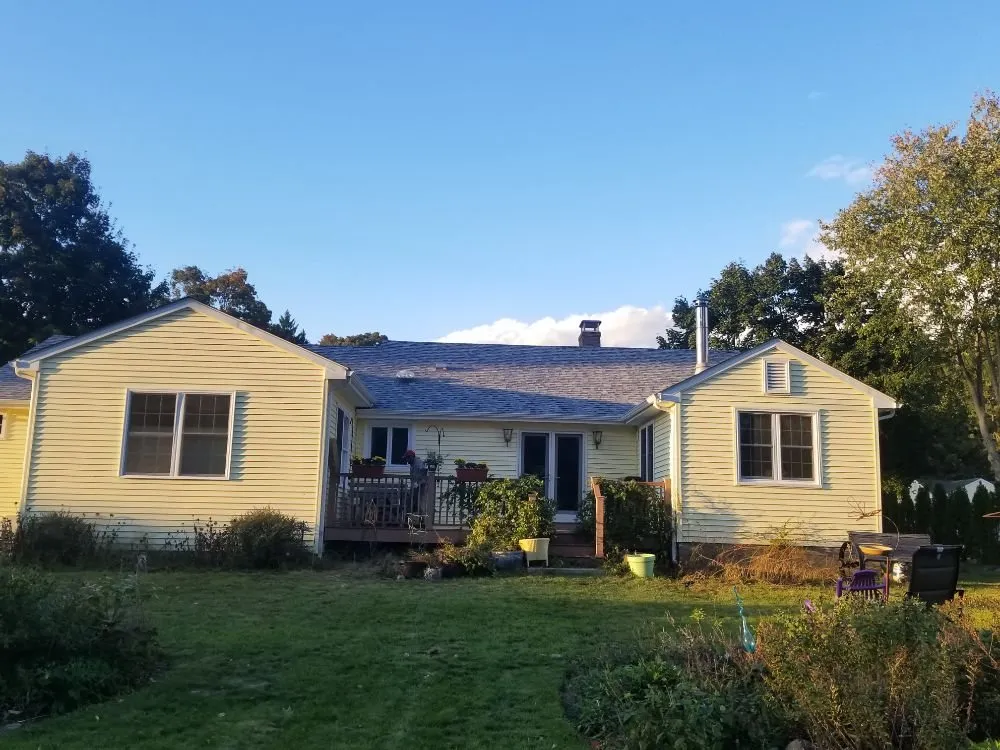 Slide of MJT Roofing