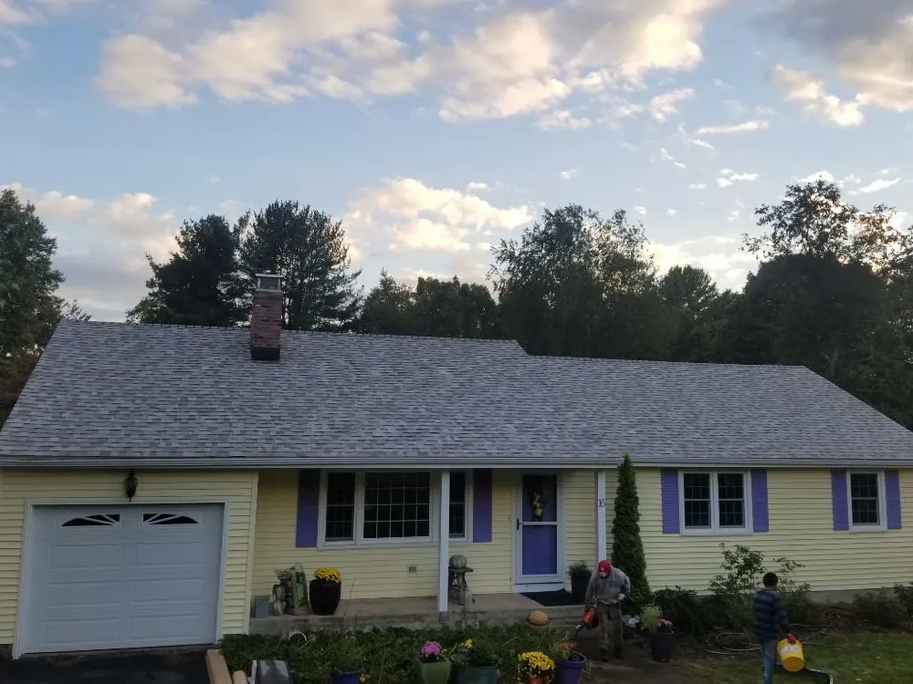 Slide of MJT Roofing