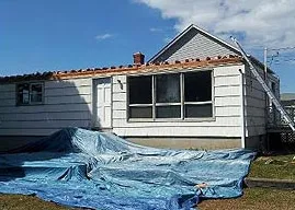 Slide of MJT Roofing