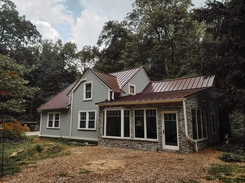 Slide of MK Roofing & Construction