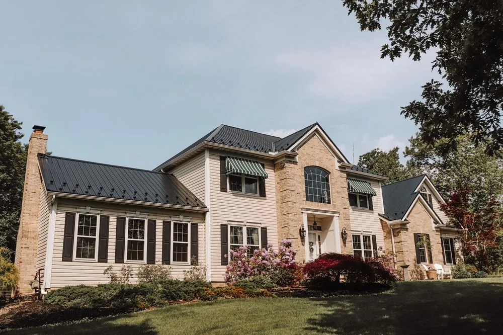 Slide of MK Roofing & Construction