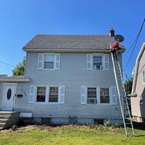 Slide of MK Roofing & Masonary