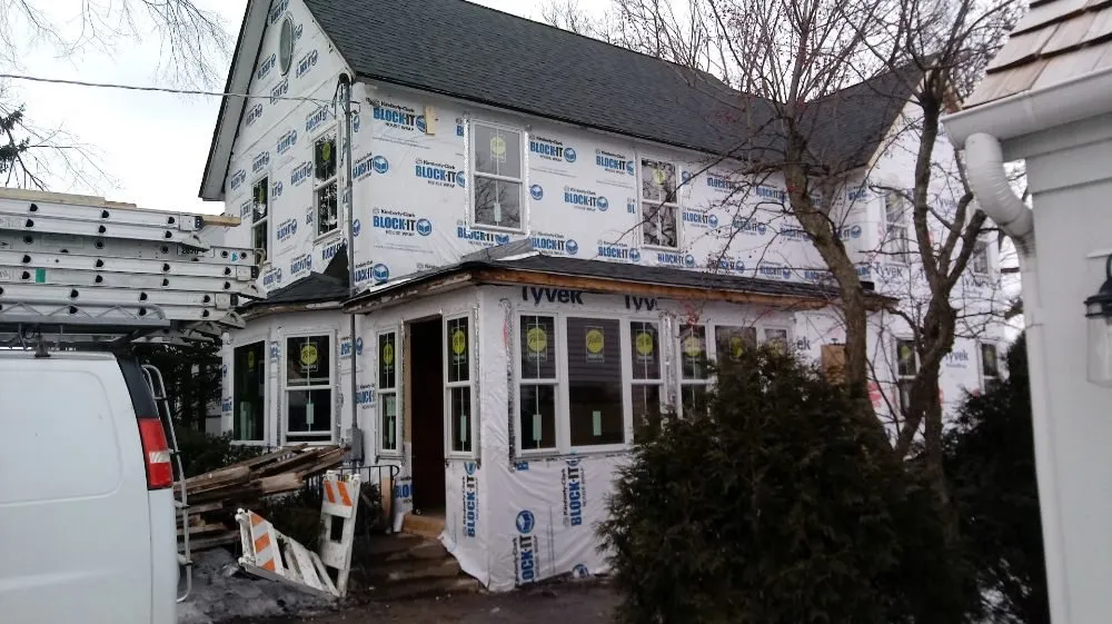 Slide of MKJ Roofing