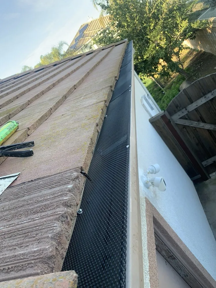 Slide of ML Gutters & Roofing