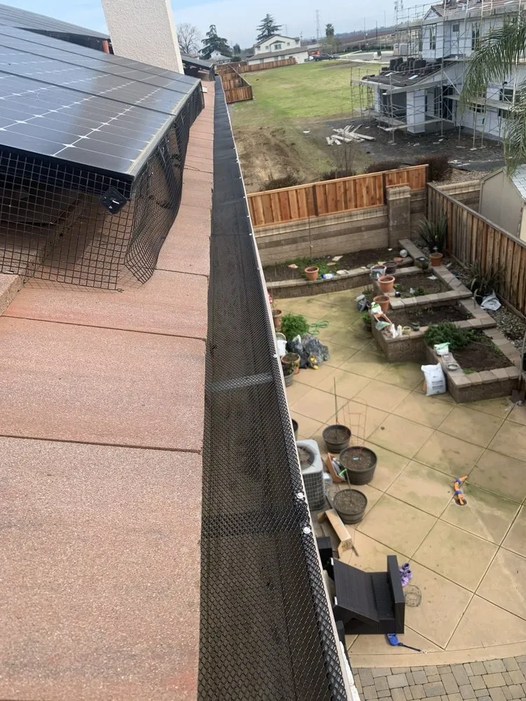 Slide of ML Gutters & Roofing