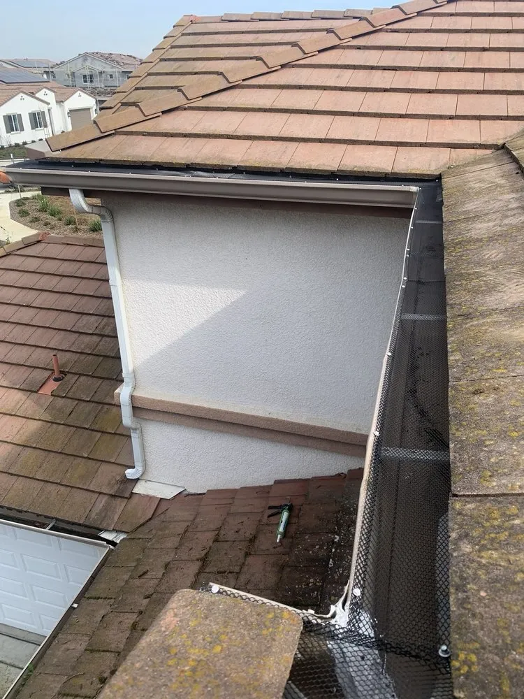 Slide of ML Gutters & Roofing