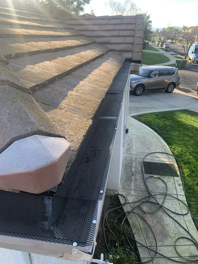Slide of ML Gutters & Roofing