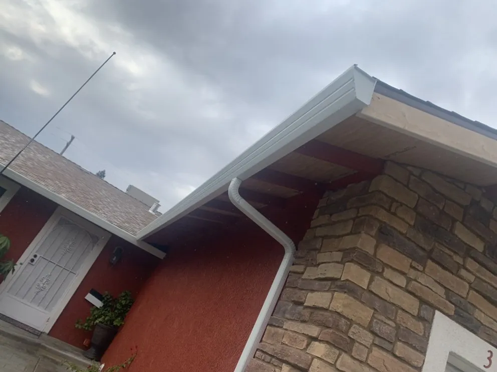 Slide of ML Gutters & Roofing