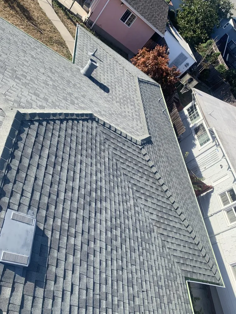 Slide of ML Gutters & Roofing