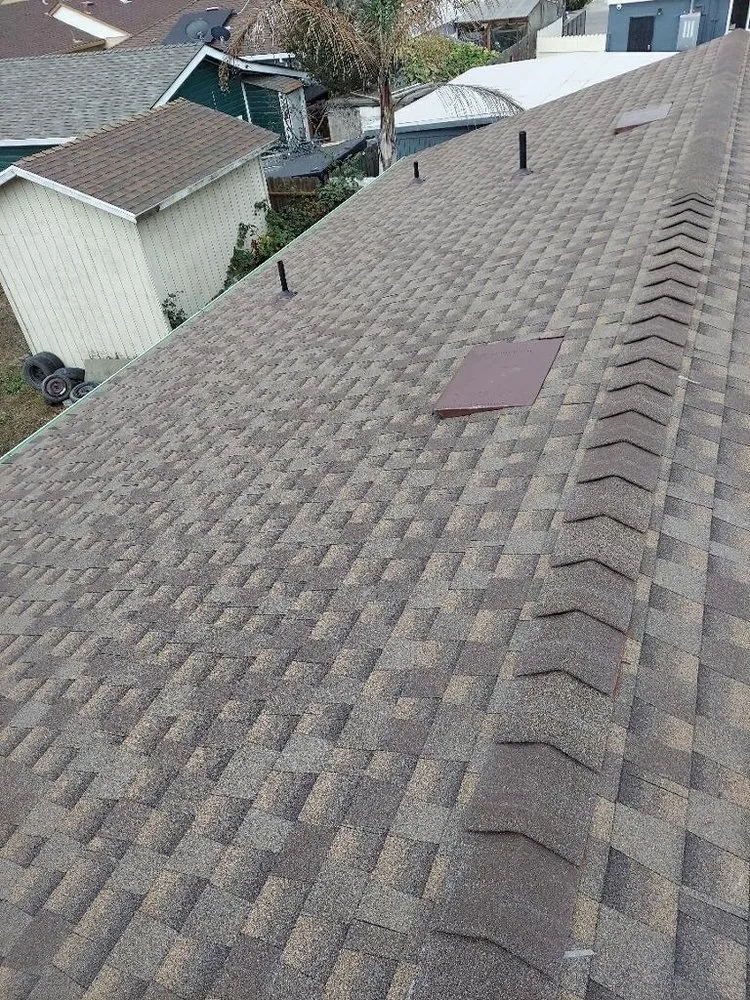 Slide of ML Gutters & Roofing