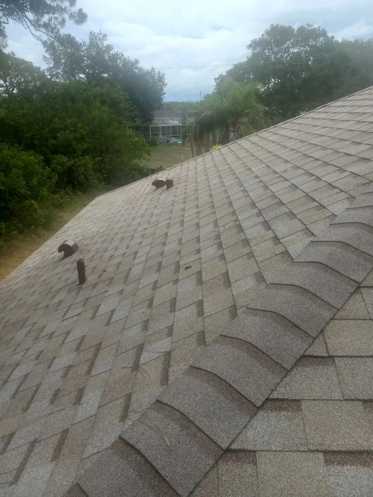 Slide of MLG Roofing