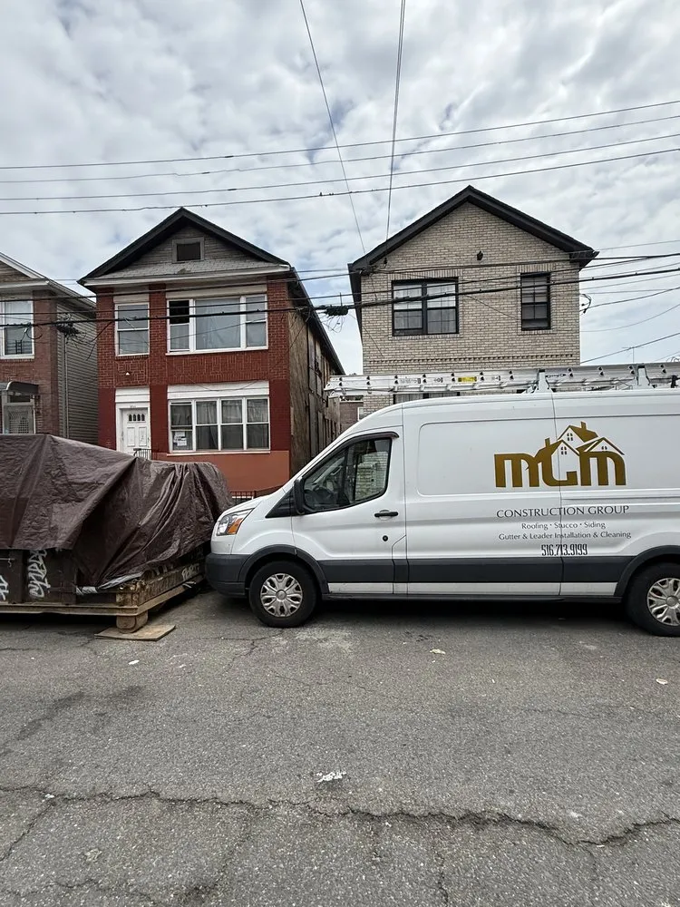 Slide of MLM Construction Roofing