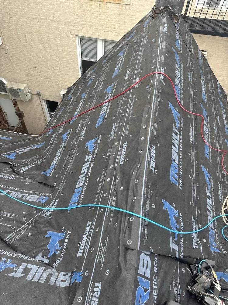 Slide of MLM Construction Roofing