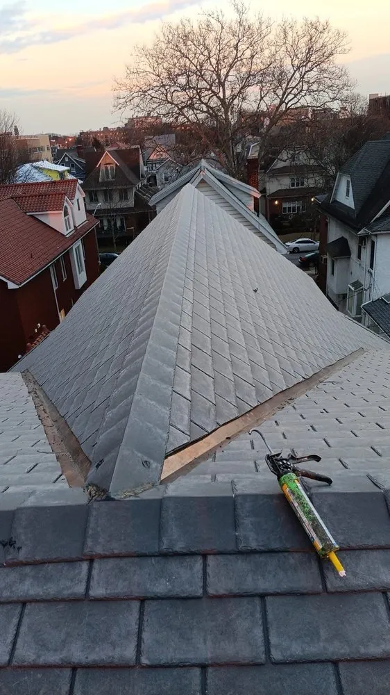 Slide of MLM Construction Roofing