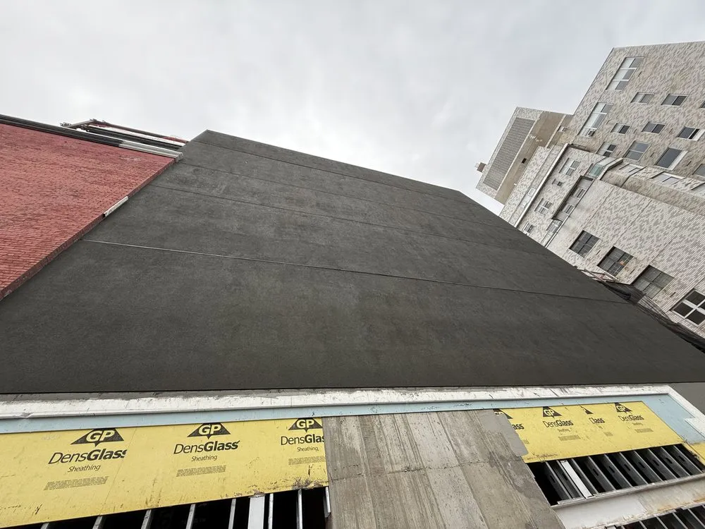 Slide of MLM Construction Roofing