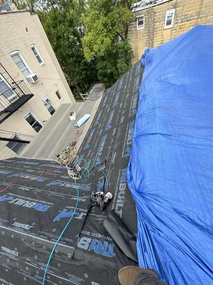 Slide of MLM Construction Roofing